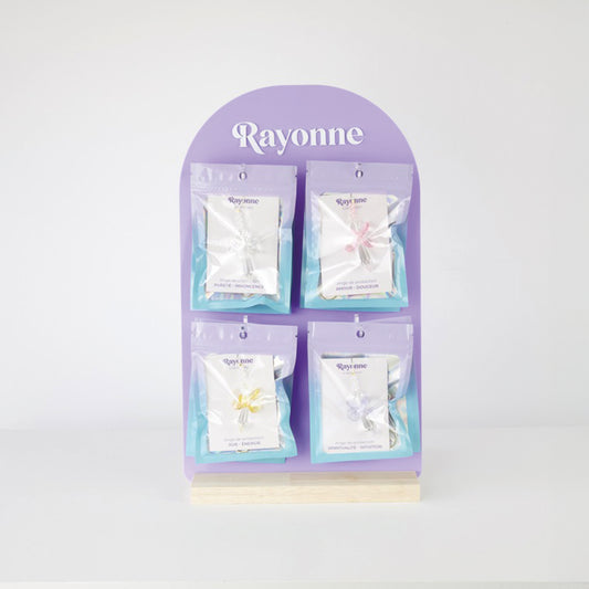 Présentoir compact Rayonne® exposant 4 modèles de Suncatchers Anges, solution clé-en-main pour points de vente.