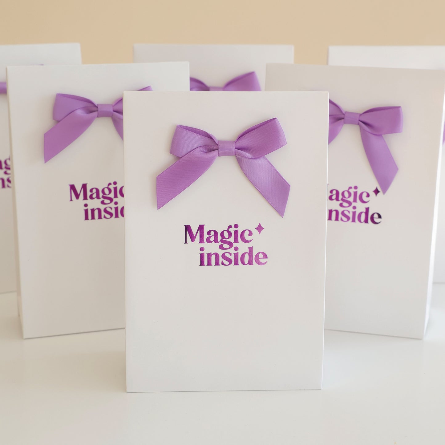 Pochettes cadeaux avec noeuds de la marque Rayonne, pour offrir les Suncatchers