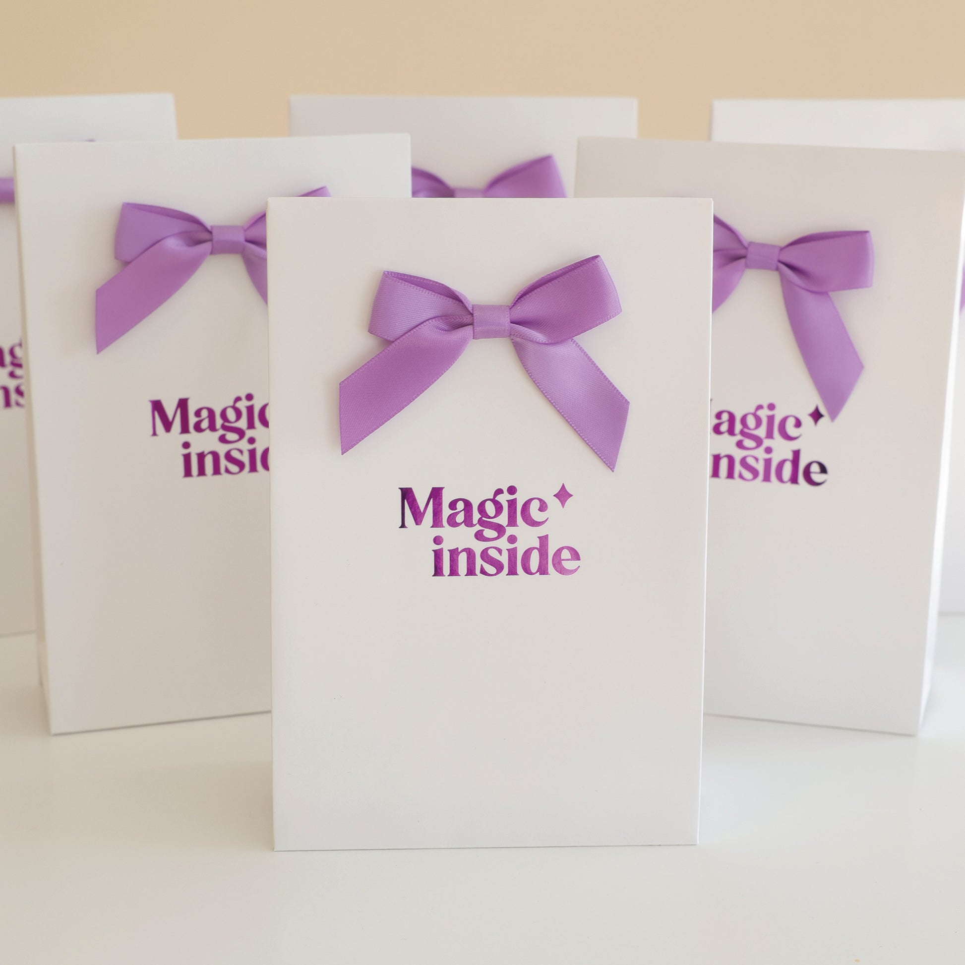 Pochettes cadeaux avec noeuds de la marque Rayonne, pour offrir les Suncatchers