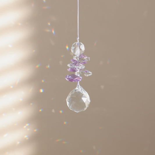 petit suncatcher en cristal violet et transparent 