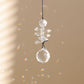 petit suncatcher en cristal suspendu et diffusant des prismes arc-en-ciel 