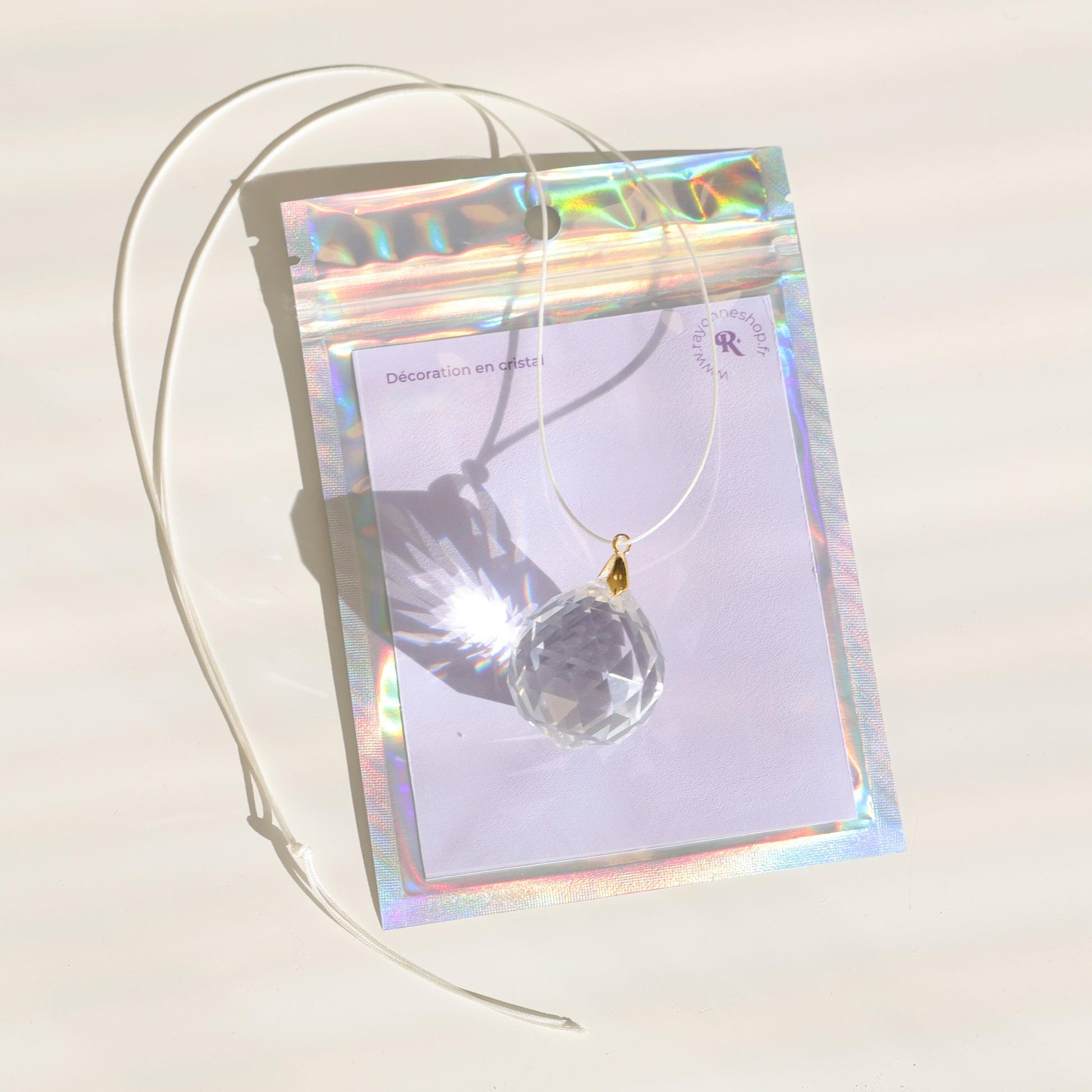 Boule en cristal de la marque rayonne et son packaging 