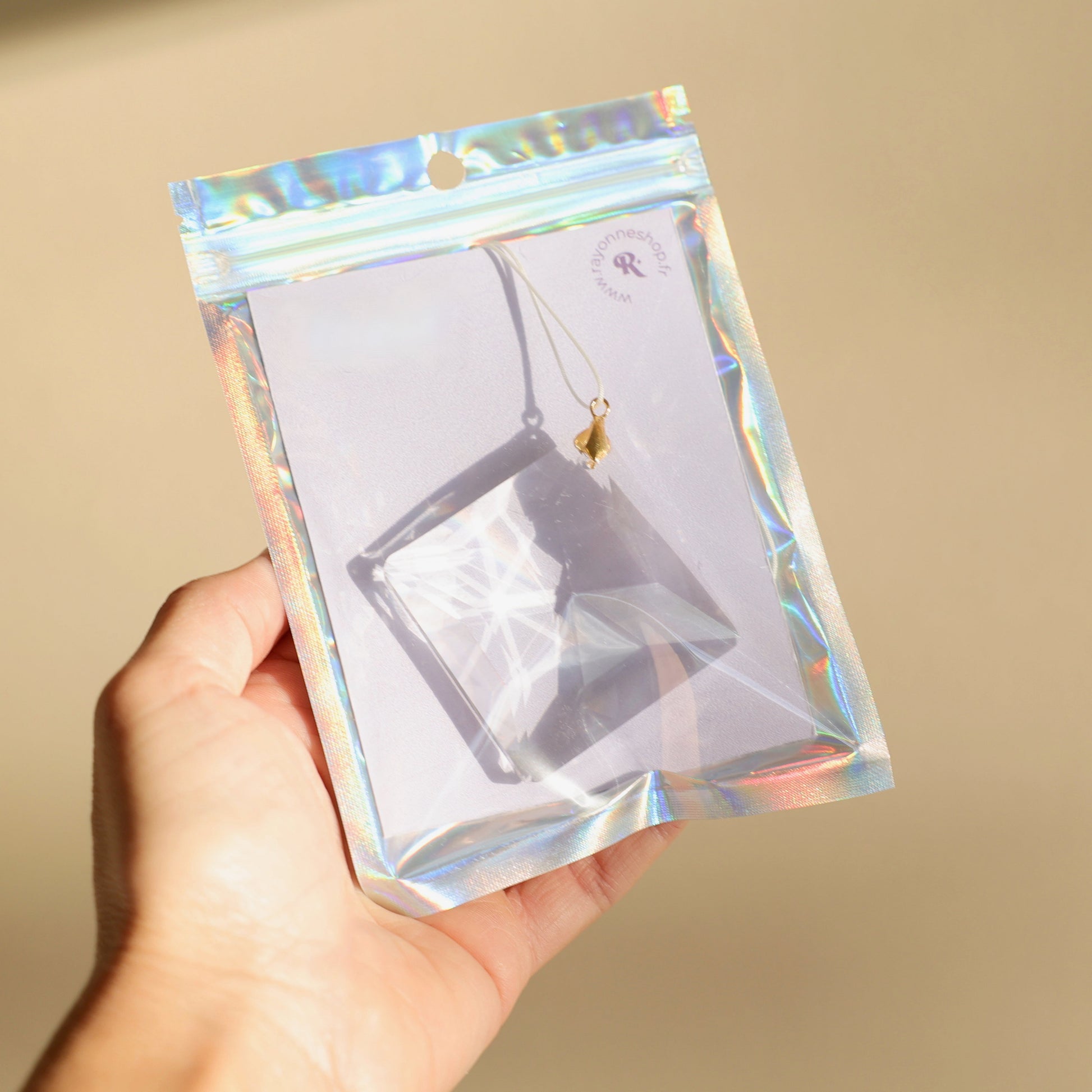 suncatcher en cristal emballé dans un packaging