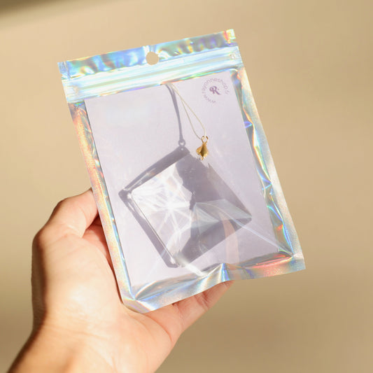 suncatcher en cristal emballé dans un packaging