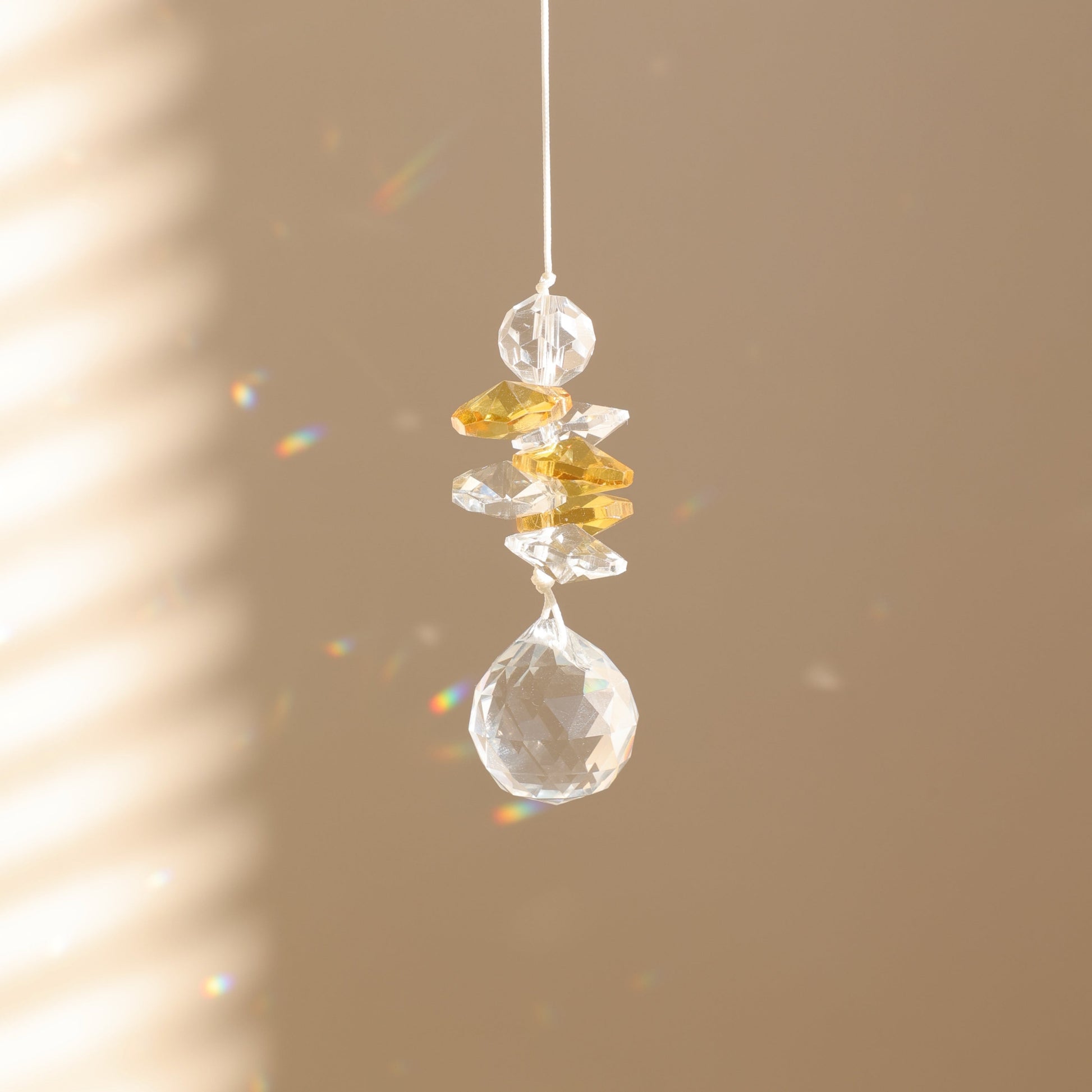 suncatcher en cristal jaune et transparent 