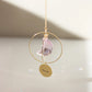 Attrape soleil avec un cristal en forme de demi lune, et un médaillon personnalisé avec le prénom de votre choix